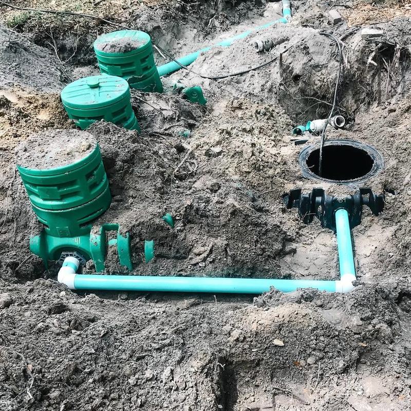 Risers and distribution pipework installed on a new septic system.