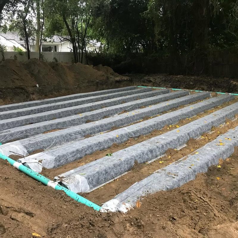 Drain field trenches laid out and ready for backfill on a Northeast Florida property.